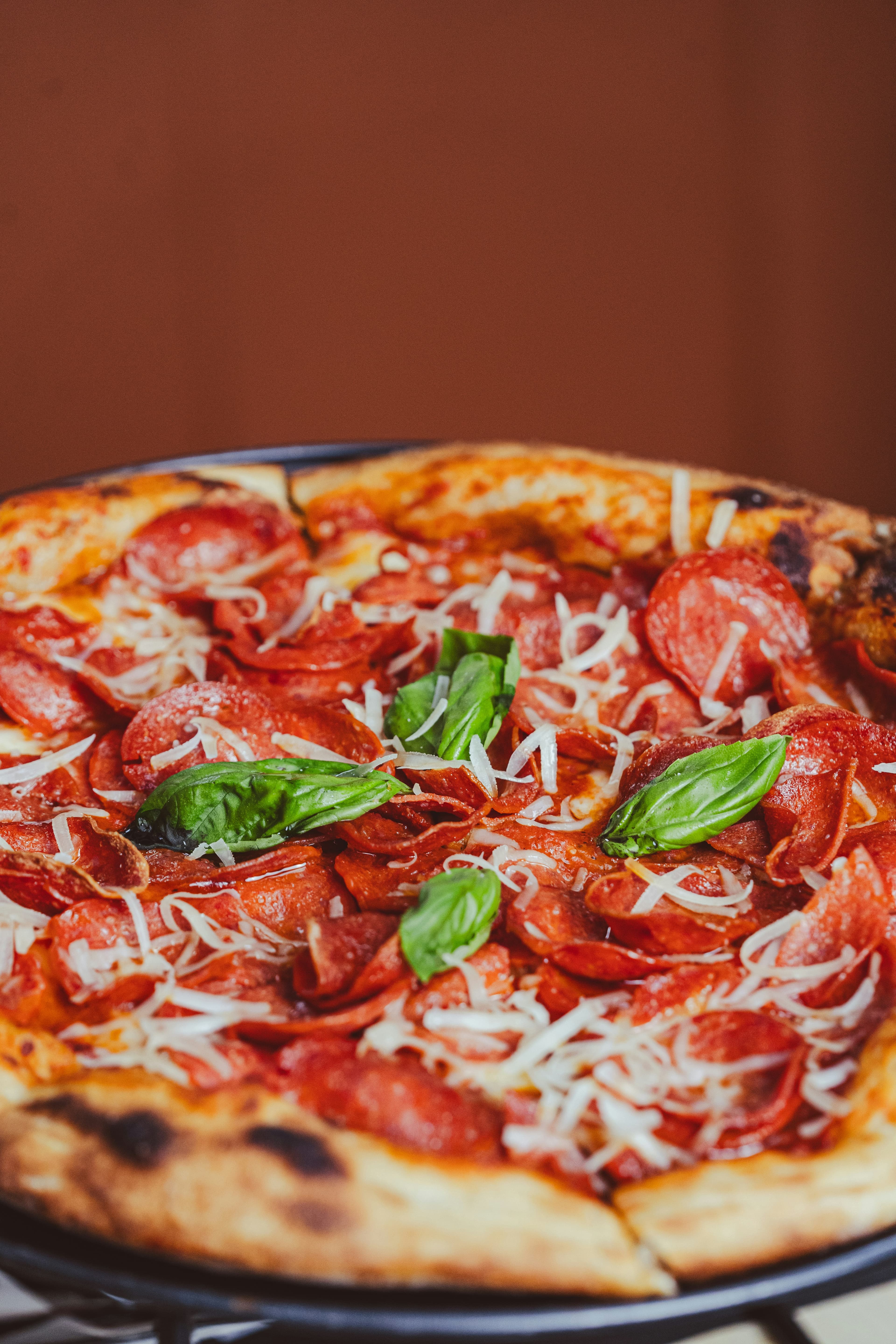 A charred crust cooling on the board