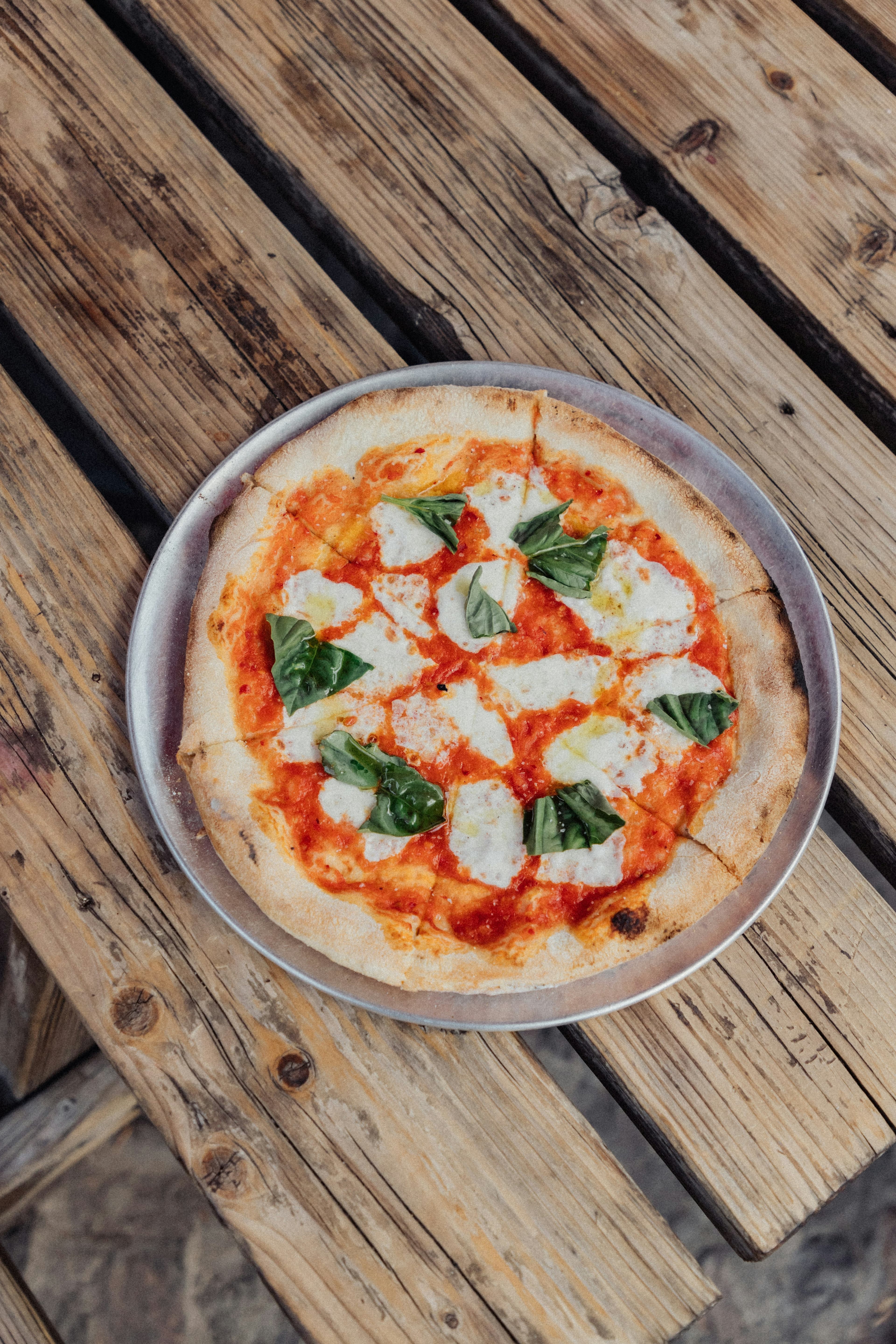 Wood-fired Margherita pizza